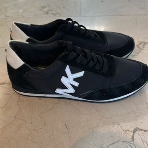 Michael Kors Black sneaker with suede details. Size 7